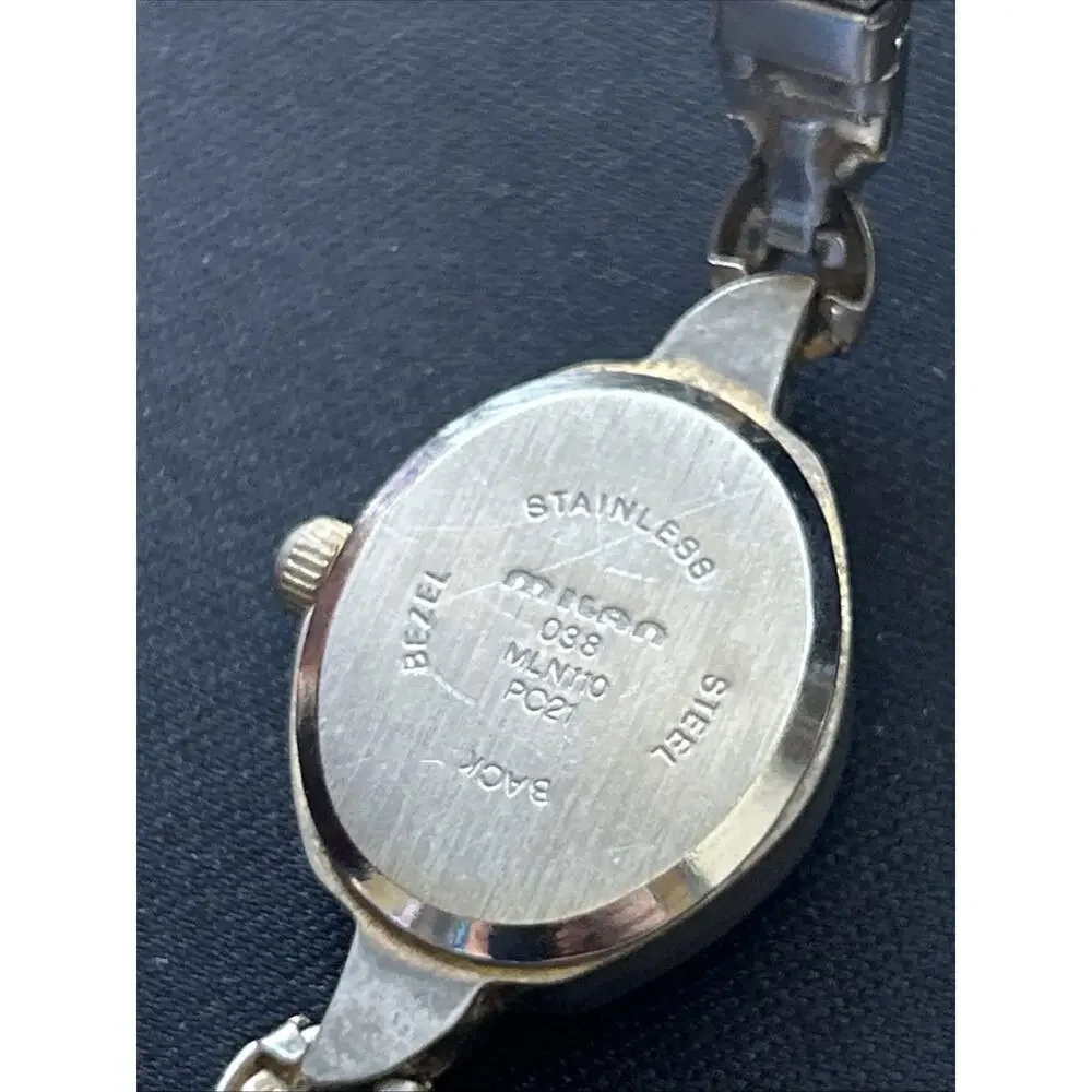 Milan Silver Tone Case Gold Tone Dial Women’s Stretch Band Quartz Watch